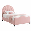 Lit simple en velours rose avec tête de lit en forme de coquillage